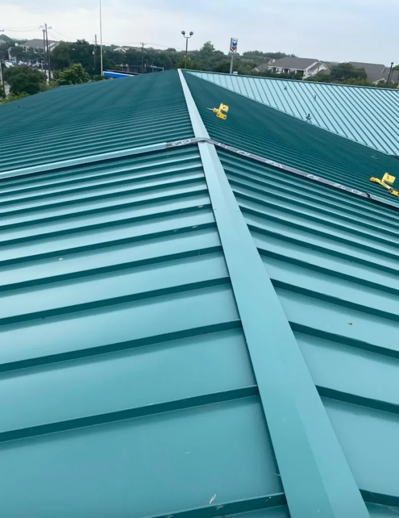 Green commercial metal roof ridge and valley for Metal Roof Repair in DeKalb