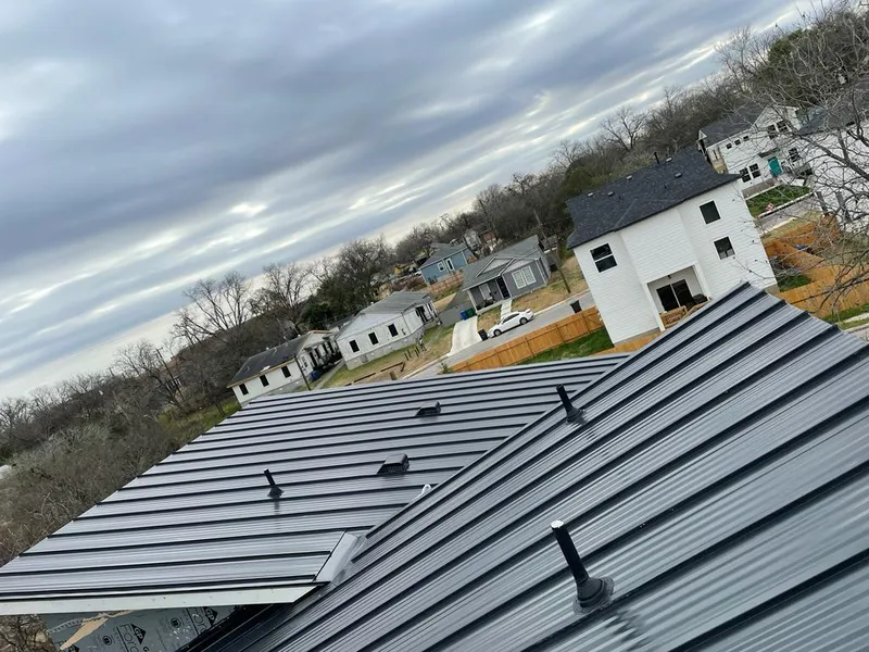 Standing seam metal roof panels with vents for Skylight Repair in DeKalb